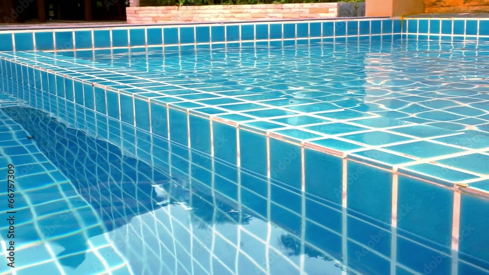 Clear blue swimming pool in tropical island. Video shift motion Clear blue swimming pool in tropical island. Video shift motion