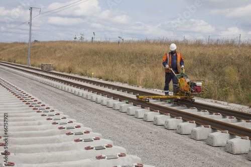 Bilde på lerret ouvrier fixant des rails