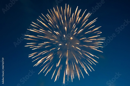 Fireworks on the background of blue sky