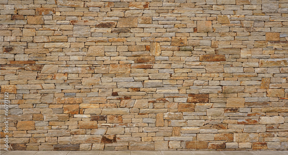 Obraz premium Schöne Natursteinwand ohne Fugenmörtel