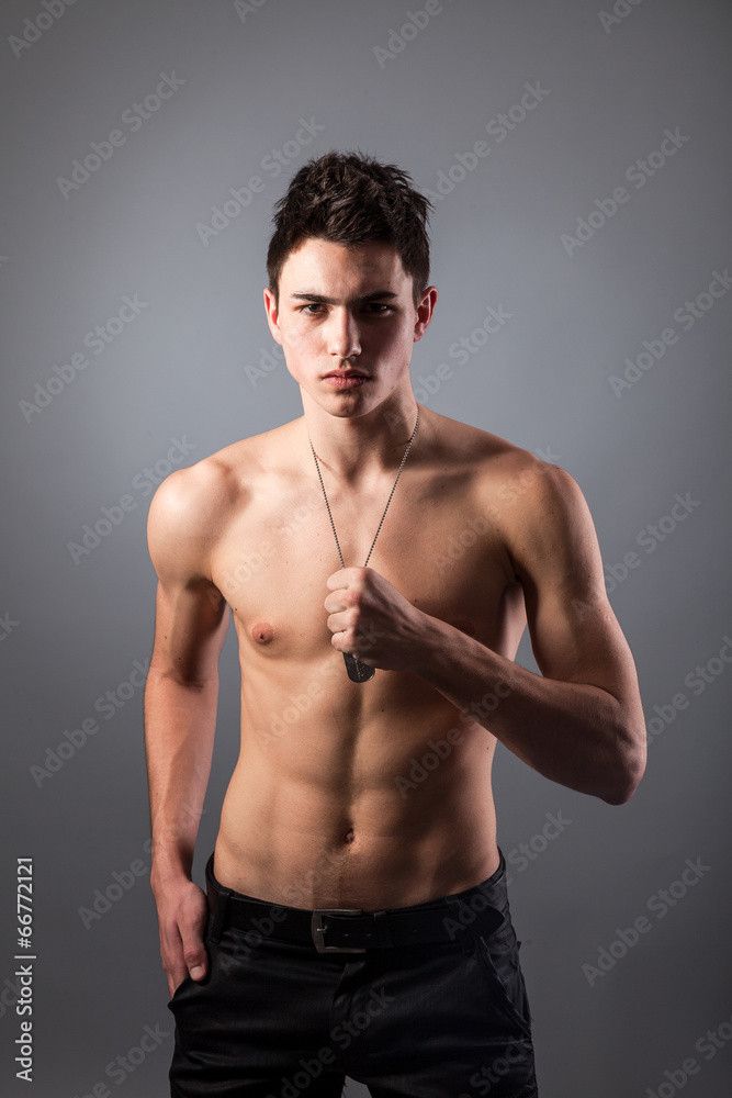 Fototapeta premium Portrait of young bodybuilder man