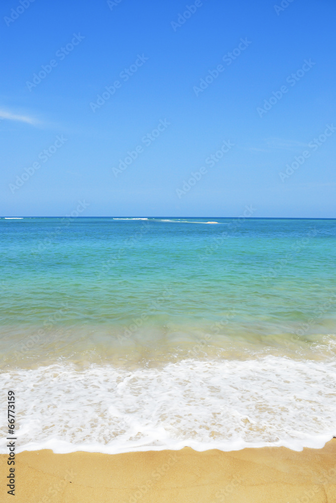 Fototapeta premium In summer vacation . Sand beach and blue sky