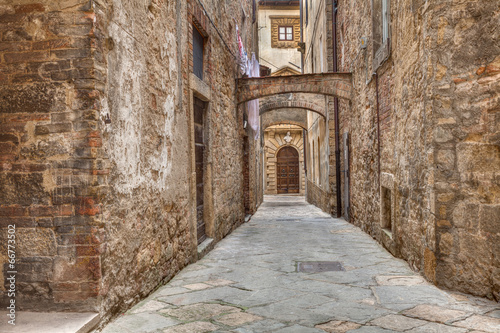 ancient alley in Volterra, Tuscany, Italy #66773502