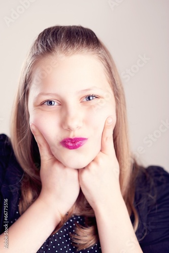 Teen girl making cute faces