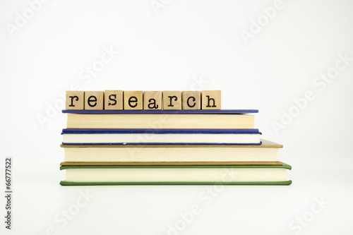 research word on wood stamps and books