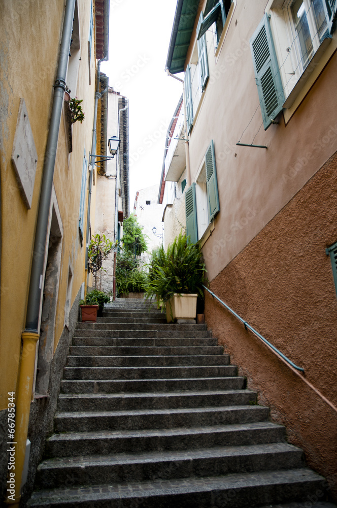 Narrow streets and old building Villefranche Town in Riviera