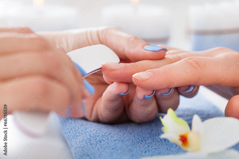 Woman Undergoing Manicure Process