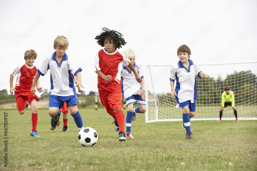 Junior 5 a side teams playing football