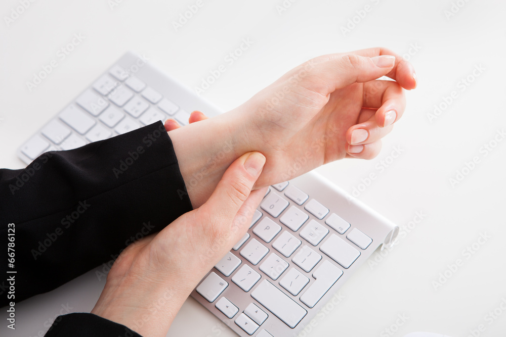 Businesswoman Suffering From Wrist Pain Businesswoman Suffering From Wrist Pain