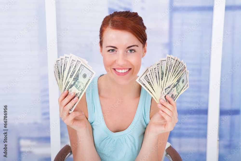 Woman Showing Dollar Bills At Home Woman Showing Dollar Bills At Home
