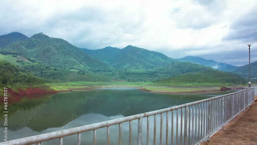 HD Time lapse Dam and mountain moving cloud zoom in HD Time lapse Dam and mountain moving cloud zoom in
