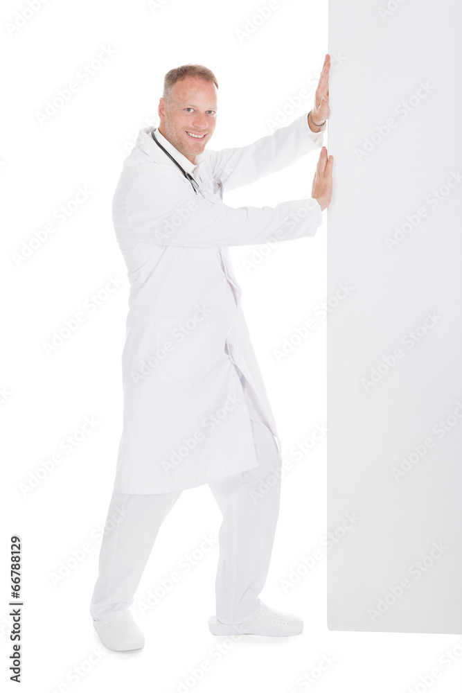 Doctor Pushing Something Over White Background Doctor Pushing Something Over White Background