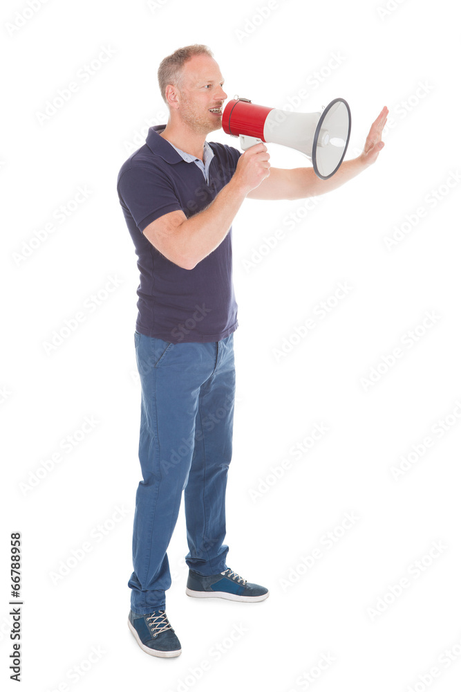 Man Screaming Into Bullhorn While Pointing Away Man Screaming Into Bullhorn While Pointing Away