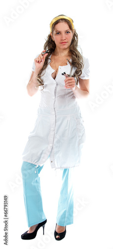 Sexy nurse standing on white background