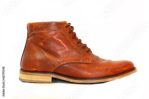 Man brown boots isolated on white background