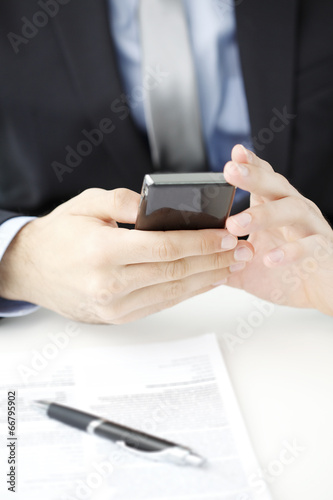 Businessman using mobile
