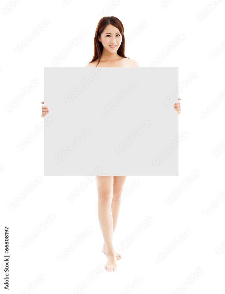 Beautiful young sexy woman holding a empty white board Beautiful young sexy woman holding a empty white board