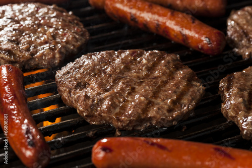 фотографія Hamburgers and Hot Dogs on the Grill