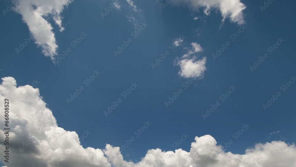 Cumulus clouds moving in the sky