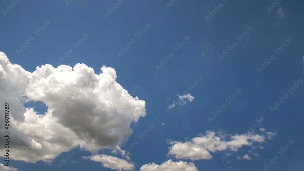 Cumulus clouds moving in the sky