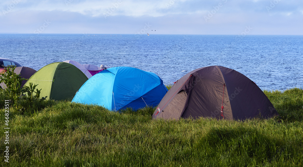 Camping with tent at seaside
