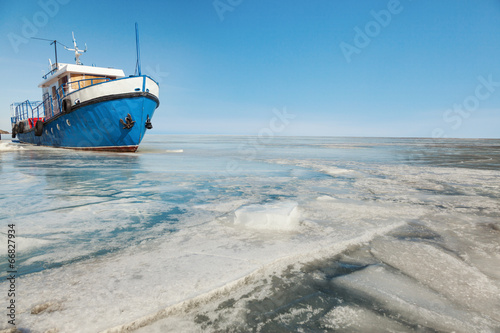 Metal ship in ice