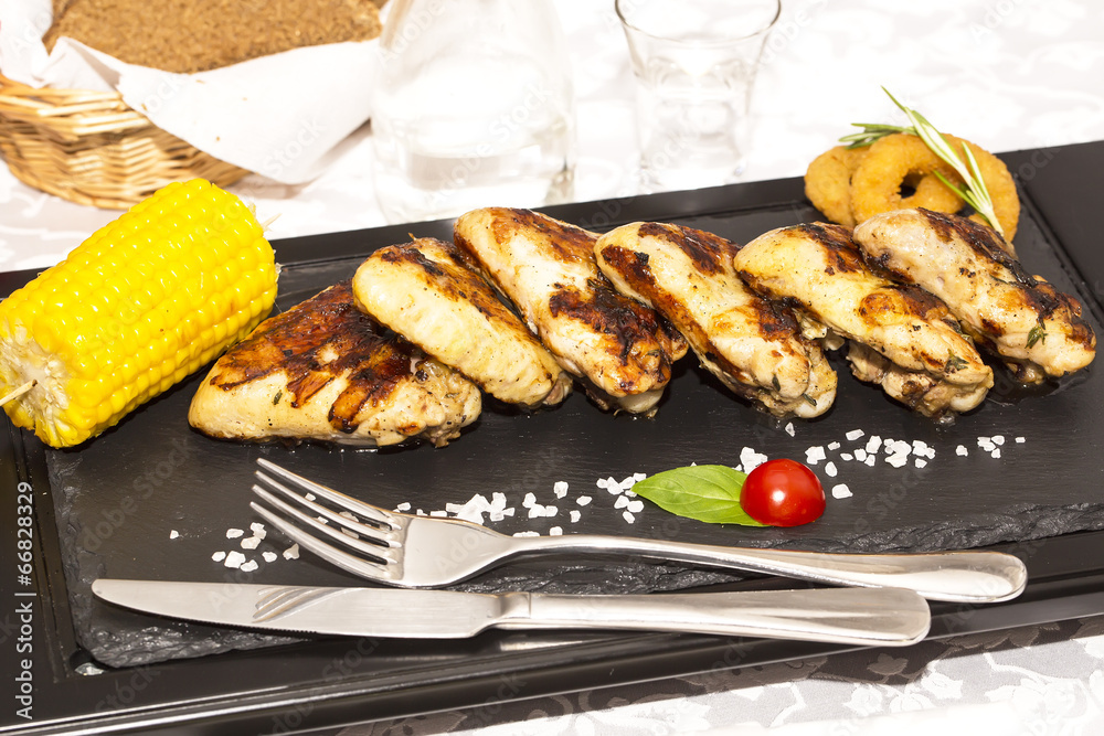 chicken wings are grilled