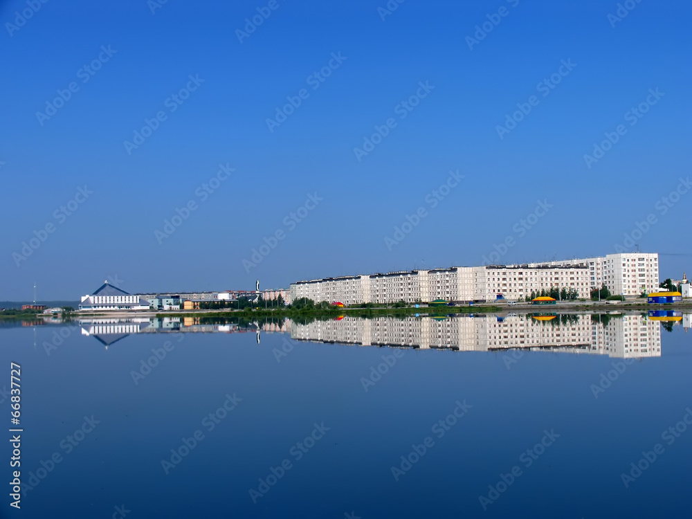 Nadym, Russia - July 20, 2004: panorama of the city on the river