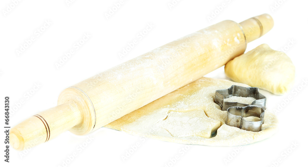 Dough and forms for cookies isolated on white