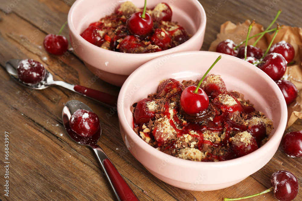 Tasty cherry dessert on table