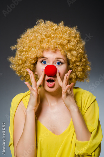 Funny woman in clown dressing