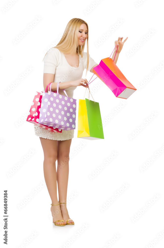 Woman with shopping bags isolated on white