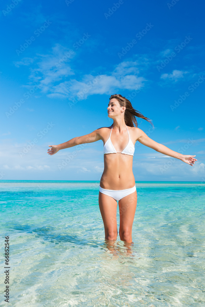 Woman Relaxing on Tropical Beach - obrazy, fototapety, plakaty 