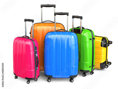 Luggage. Colorful suitcases on white isolated background.