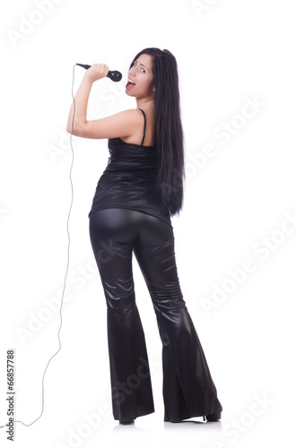 Young female singer with mic on white