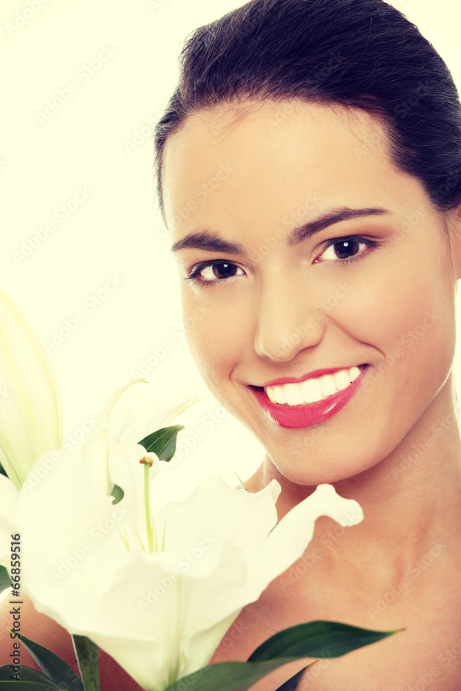 Spa woman with lily flower Spa woman with lily flower