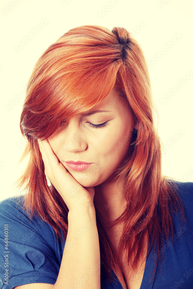 Young woman in pain is having toothache Young woman in pain is having toothache
