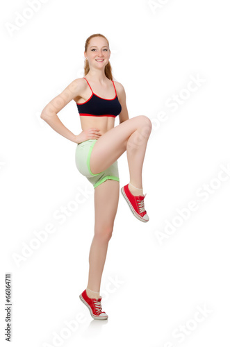 Young woman doing sport exercises isolated on white