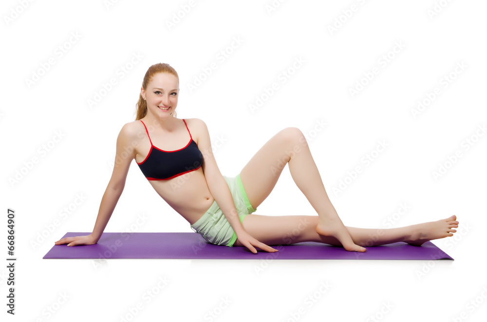 Young woman doing sport exercises isolated on white Young woman doing sport exercises isolated on white