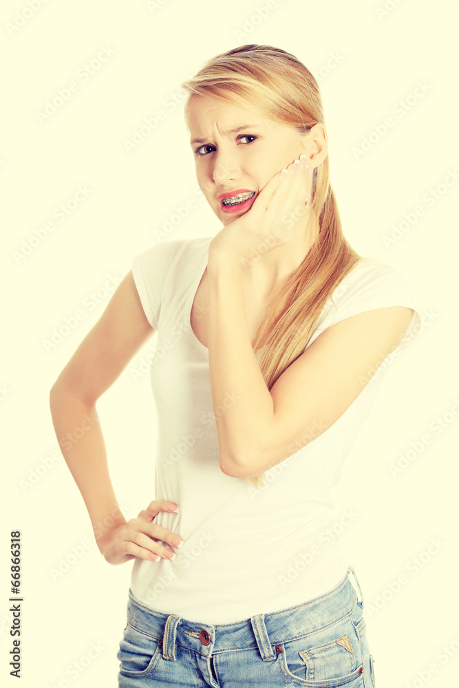 Young woman is having toothache Young woman is having toothache