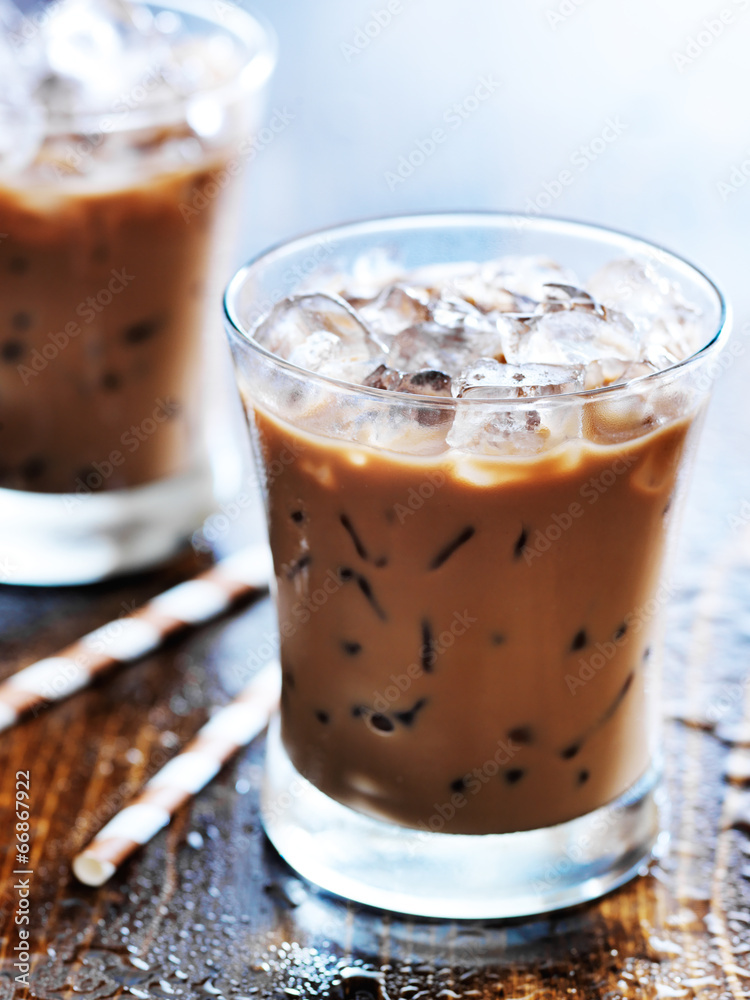 two glasses of iced coffee shot with selective foc us two glasses of iced coffee shot with selective foc us