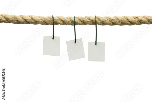 Three cards hanging off a rope