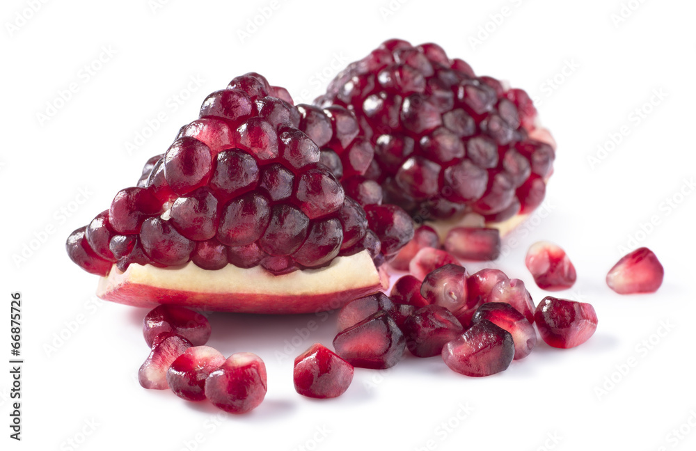Big fresh piece of pomegranate isolated on white background Big fresh piece of pomegranate isolated on white background