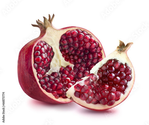 Half of pomegranate and quarter slice isolated on white backgrou