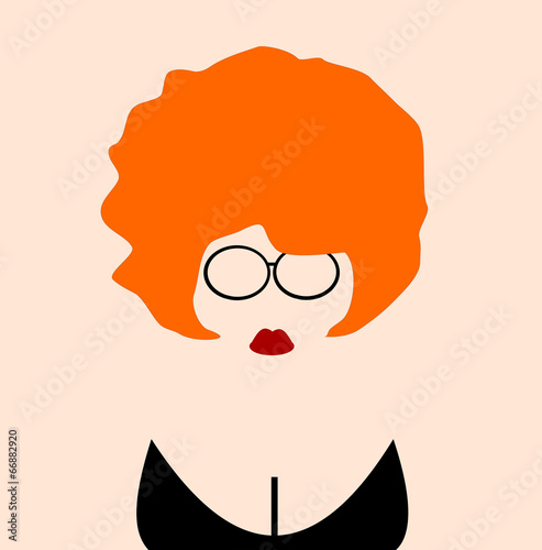 woman with orange hair wearing glasses