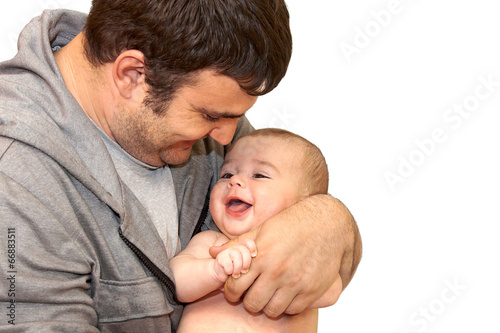 Happy father playing with his ​​little son