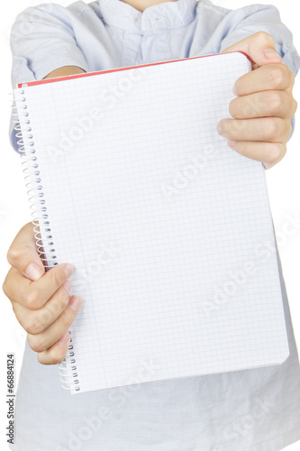 Boy showing his notebook