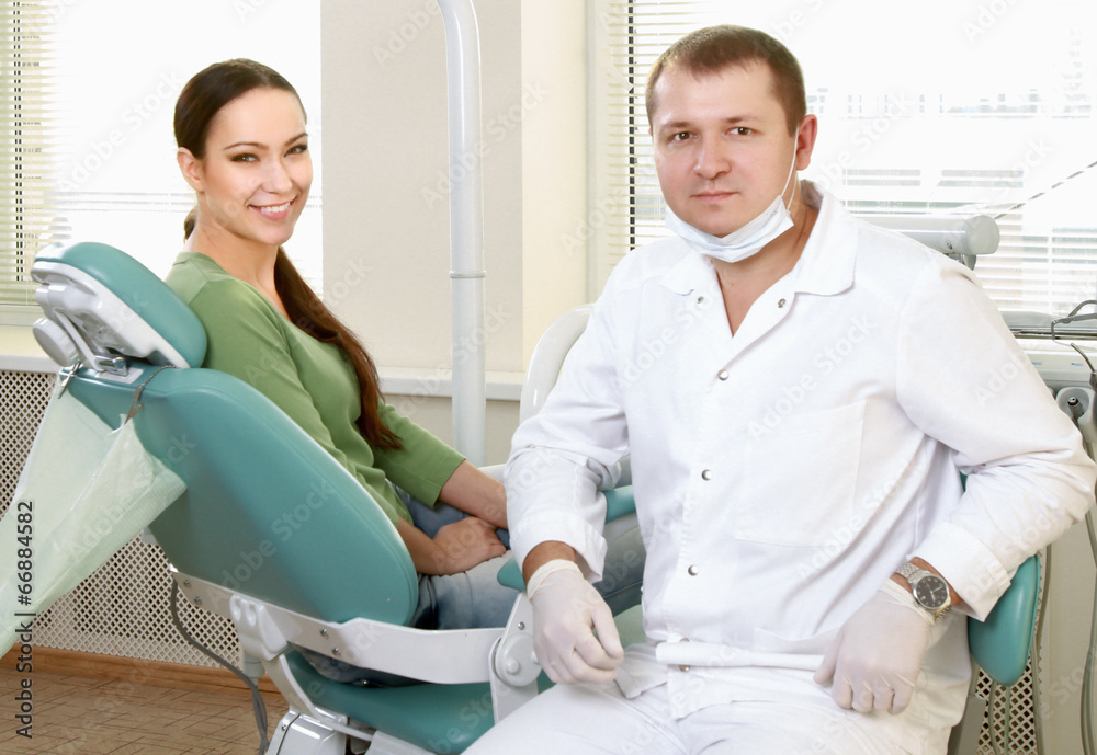 Young woman with dentist in a dental surgery. Healthcare, Young woman with dentist in a dental surgery. Healthcare,