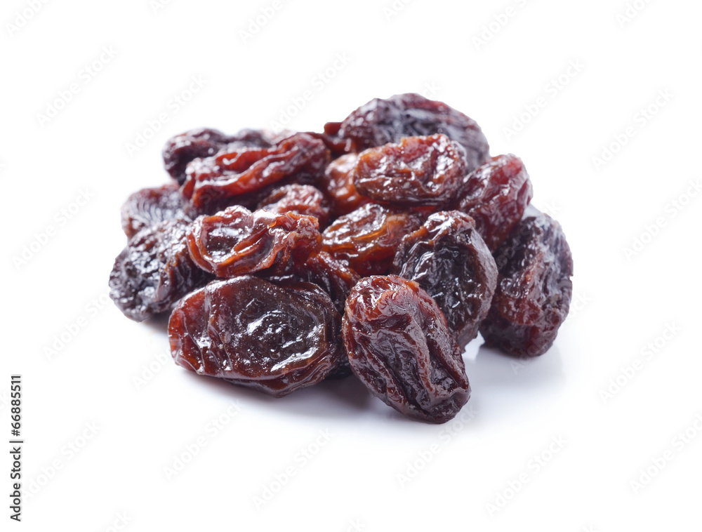 pile of raisins on white background pile of raisins on white background