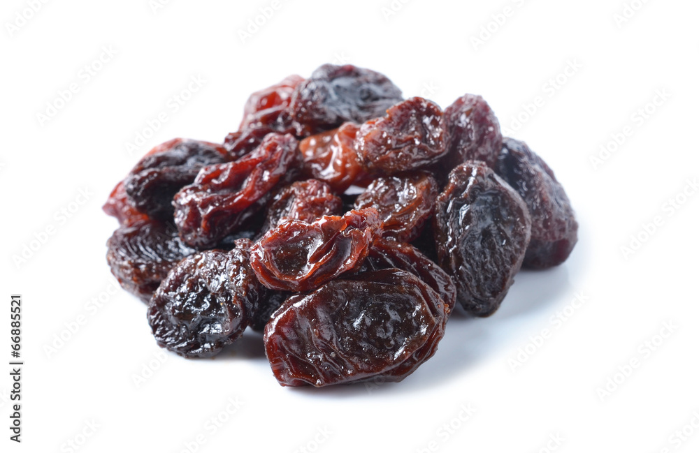 pile of raisins on white background pile of raisins on white background